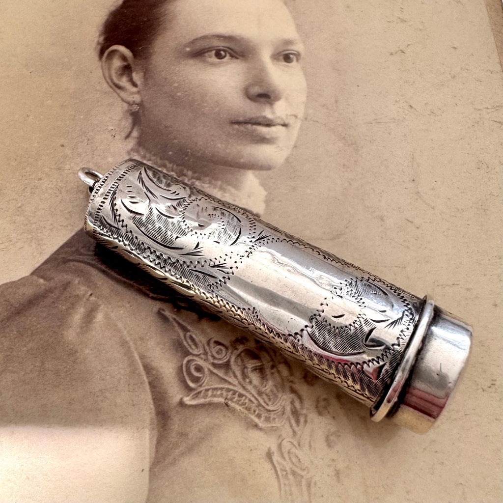 Vonk Jewellery 1915 sterling silver cheroot case and holder on an antique photograph