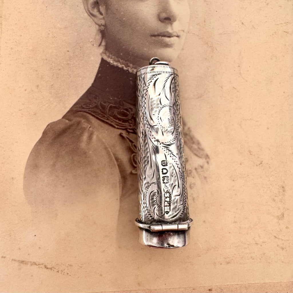 Vonk Jewellery 1915 sterling silver cheroot case and holder on an antique photograph