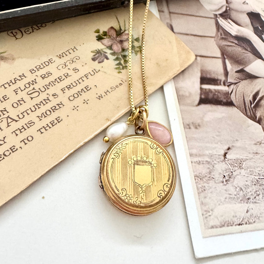 Vonk Jewellery 9ct gold back and front Edwardian locket with pearl and pink opal charms on vintage postcards