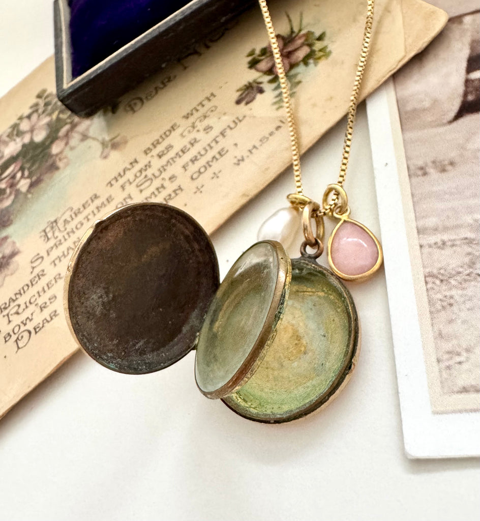 Vonk Jewellery 9ct gold back and front Edwardian locket with pearl and pink opal charms on vintage postcards