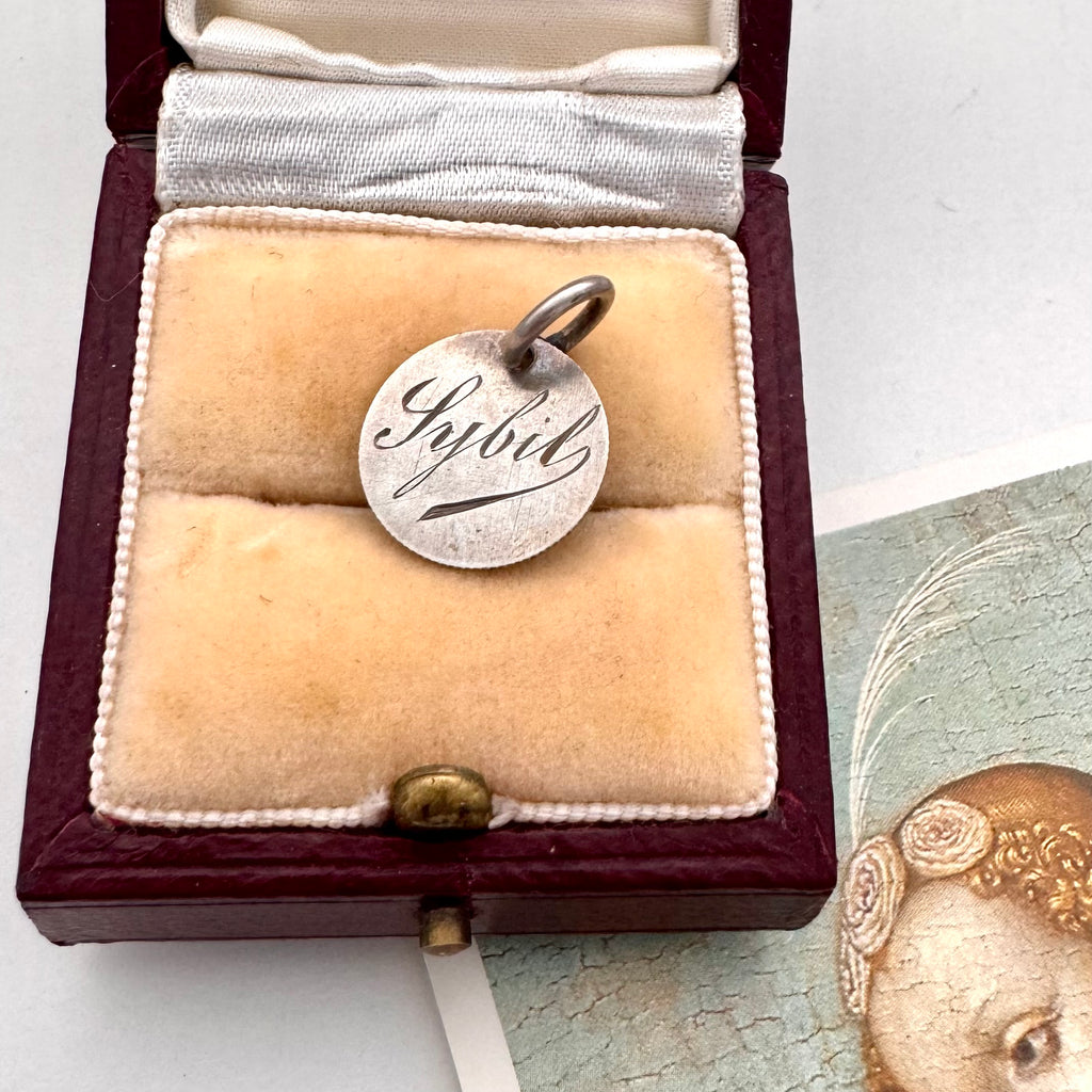 Antique french love token with name Sybil engraved on one side in a jewellery box