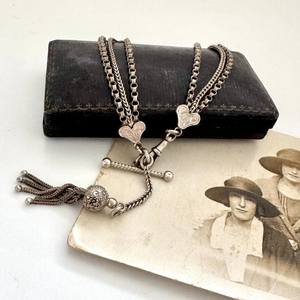 Antique Victorian continental silver triple strand Albertina watch chain with tassel on an old photograph
