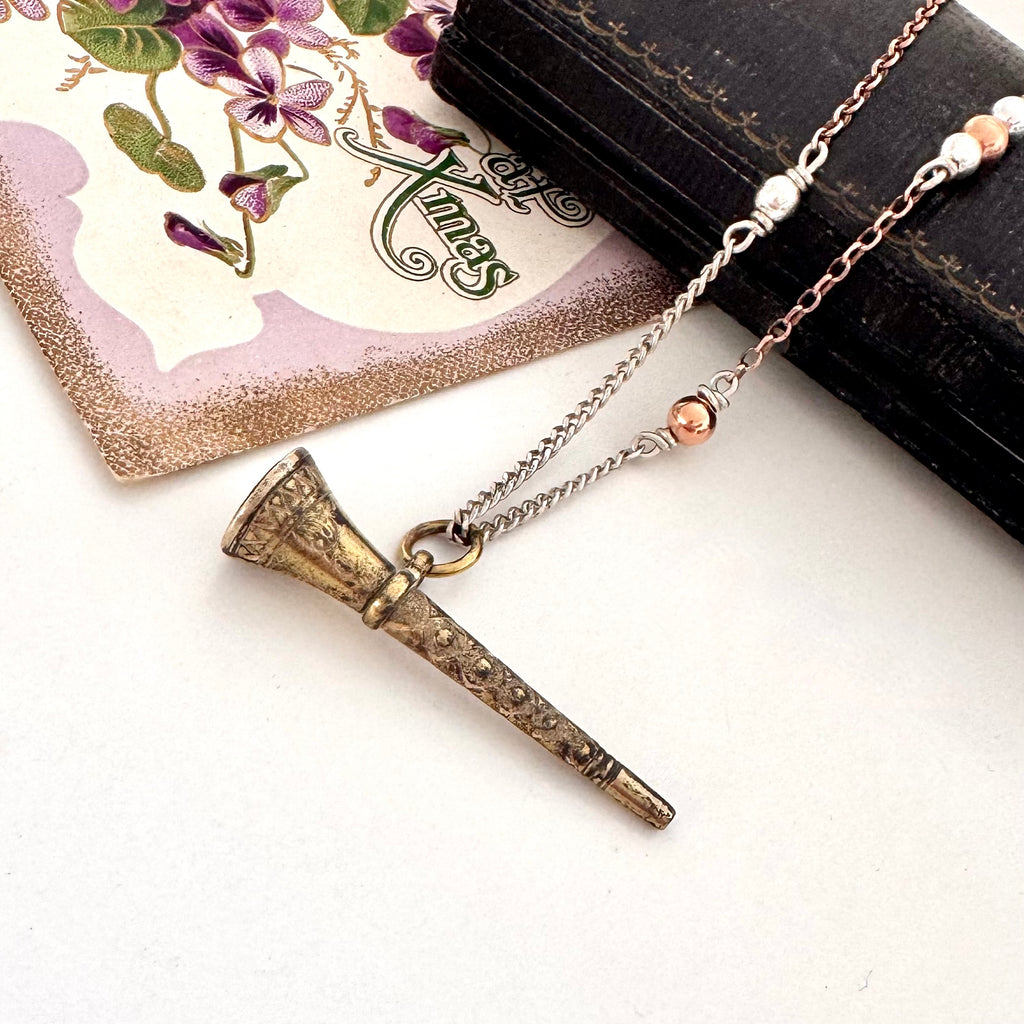 Antique gilt watch key necklace with a old jewellery box and vintage Christmas card