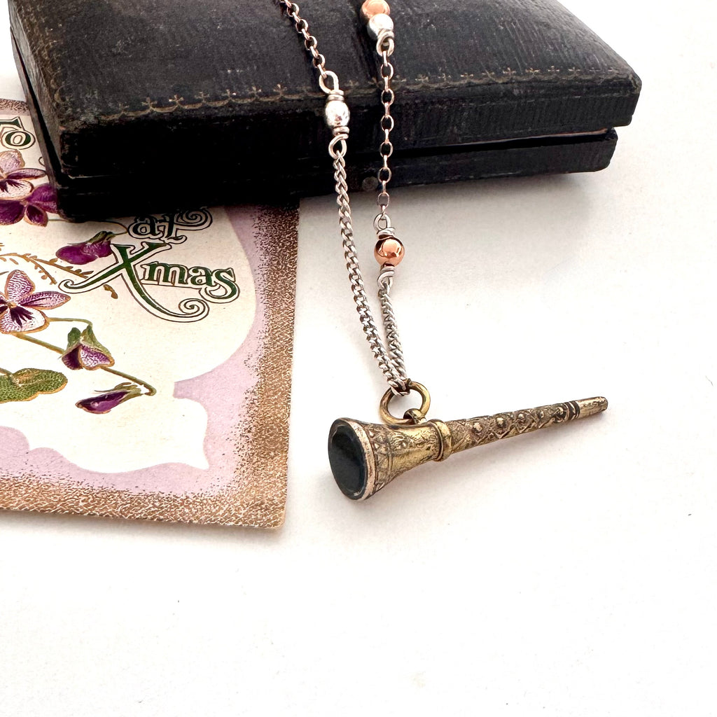 Antique gilt watch key necklace with a old jewellery box and vintage Christmas card