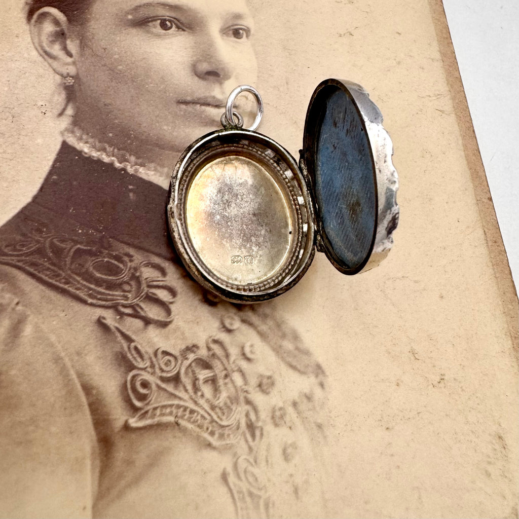 Vonk Jewellery antique 1884 Victorian silver locket n an antique photograph of a woman