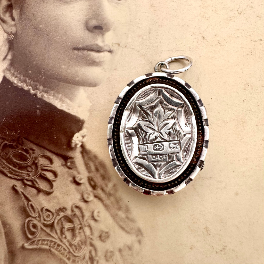 Vonk Jewellery antique 1884 Victorian silver locket n an antique photograph of a woman