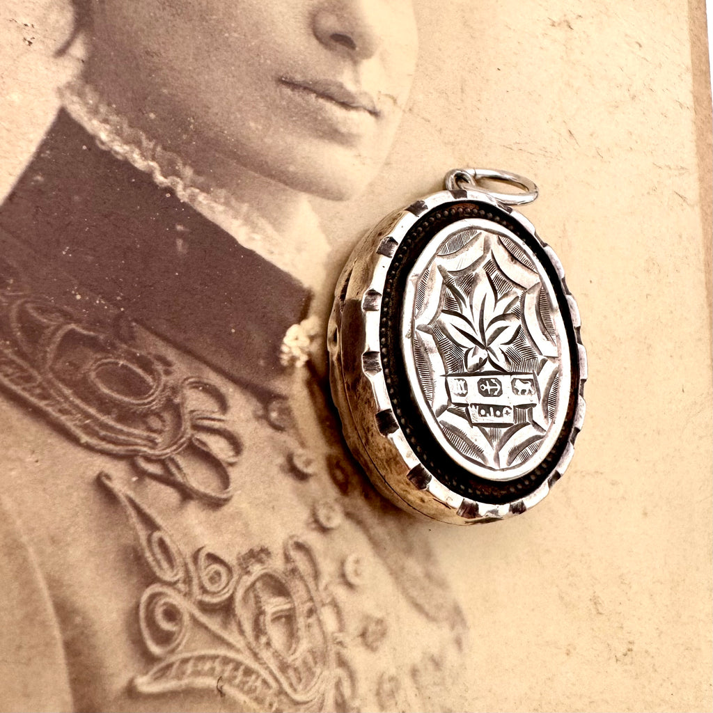 Vonk Jewellery antique 1884 Victorian silver locket n an antique photograph of a woman