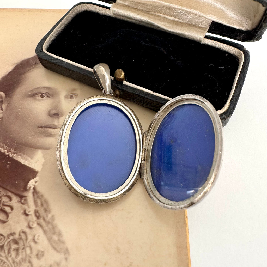 Vonk Jewellery Victorian silver Amity, Eternity and Infinity locket on an antique photo of a woman