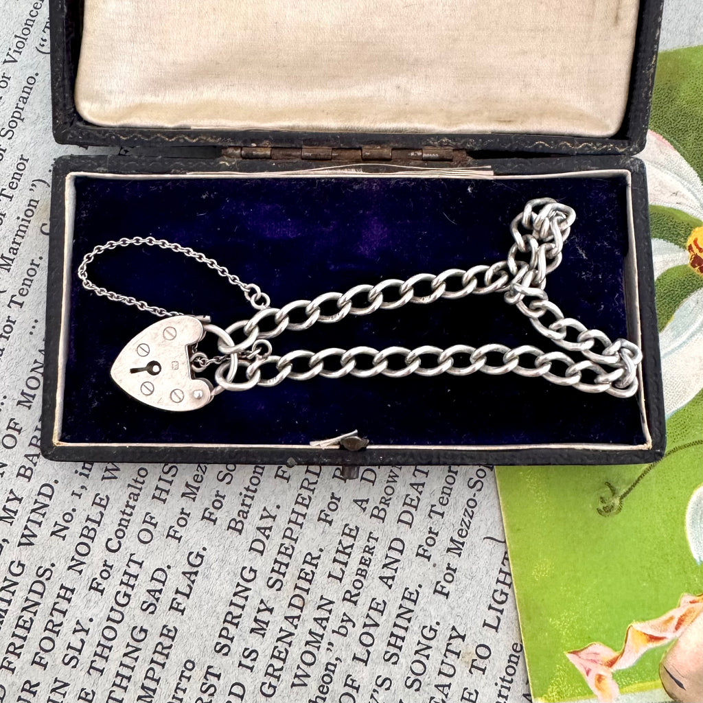 Silver chain bracelet with heart padlock in a vintage box