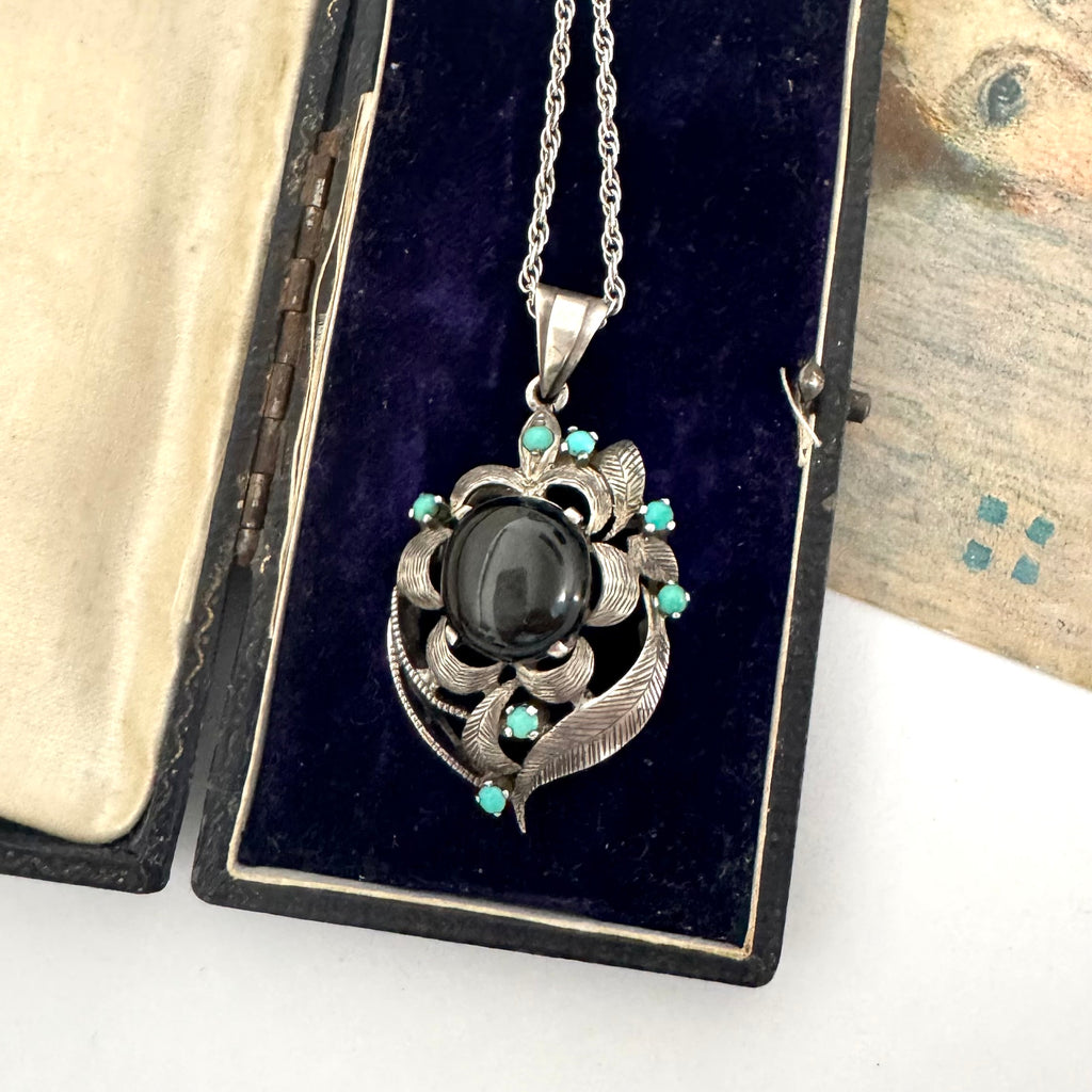 Vintage art nouveau mid century revival necklace with black stone and turquoise stones in an old jewellery box