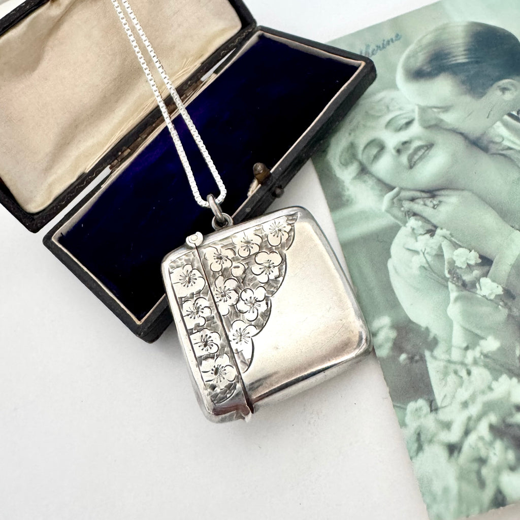 Vonk Jewellery 1905 antique vesta case necklace on a vintage postcard