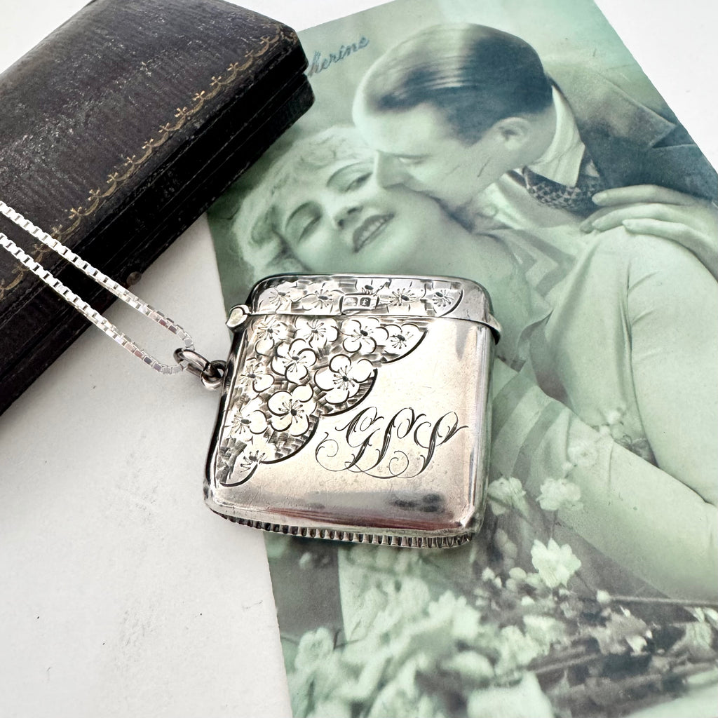 Vonk Jewellery 1905 antique vesta case necklace on a vintage postcard