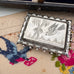 Vonk Jewellery aesthetic era Victorian antique swallow brooch on a vintage embroidered postcard