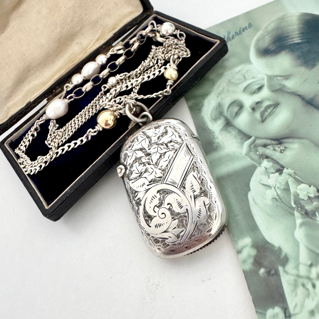 Vonk Jewellery antique vesta case necklace with a vintage postcard and jewellery box