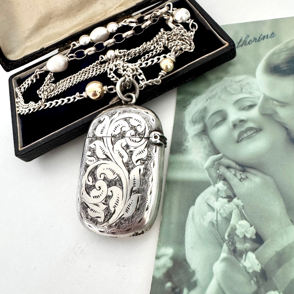 Vonk Jewellery antique vesta case necklace with a vintage postcard and jewellery box