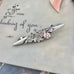 Vonk Jewellery antique silver sweetheart brooch on a vintage postcard