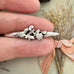 Vonk Jewellery antique silver sweetheart brooch in a womans hand