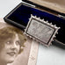 Vonk Jewellery antique sterling silver aesthetic brooch with swallow engraving on a vintage jewellery box