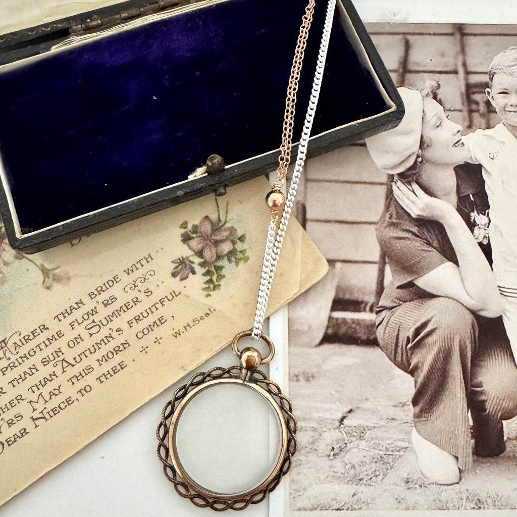 Vonk Jewellery antique rolled rose gold double sided photo locket necklace on vintage postcards and with a vintage jewellery box