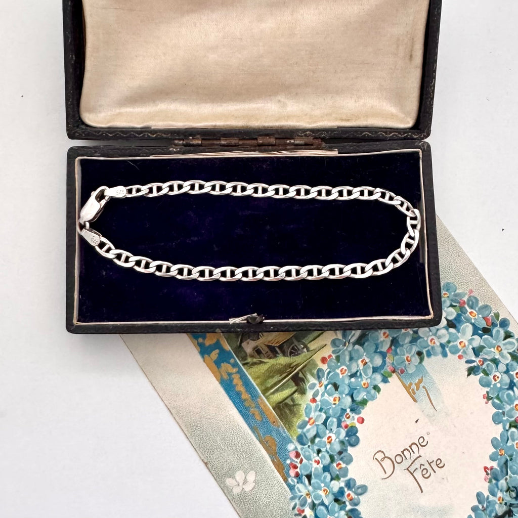 Vonk Jewellery sterling silver mariner link bracelet on an old jewellery box and on a vintage Christmas postcard