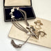 Antique Victorian continental silver triple strand Albertina watch chain with tassel on an old photograph