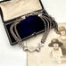 Antique Victorian continental silver triple strand Albertina watch chain with tassel on an old photograph