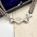 Antique Victorian continental silver triple strand Albertina watch chain with tassel on an old photograph