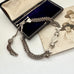 Antique Victorian continental silver triple strand Albertina watch chain with tassel on an old photograph