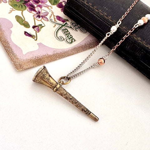 Antique gilt watch key necklace with a old jewellery box and vintage Christmas card