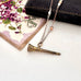 Antique gilt watch key necklace with a old jewellery box and vintage Christmas card