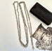 Antique silver fancy link guard chain on an old jewellery box and with an engraved picture in the corner