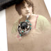 Vintage art nouveau mid century revival necklace with black stone and turquoise stones on a textured surface
