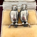 Antique silver owl brooch in a wooden box with 'Melbourne' branding.