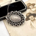 Rare Victorian Aesthetic Era hallmarked 1883 sterling silver brooch with otter or beaver engraving on an old photo and with an old jewellery box.