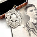 Large antique William Hair Haseler silver watch fob on an old photograph of a woman and jewellery box