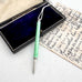 Art Deco silver and guilloche enamel propelling pencil resting inside an open dark velvet box next to an old handwritten letter on aged paper.