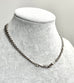 Edwardian sterling silver Albert watch chain on agrey mannequin