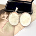 Open antique 1885 sterling silver and rose gold locket with an old postcard of a woman.