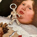 Vonk Jewellery vintage silver clown charm on a picture of an old masters painting
