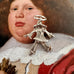 Vonk Jewellery vintage silver clown charm on a picture of an old masters painting