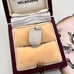 Vintage Norwich silver travel charm on a jewellery box