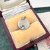 Vintage Uno A Erre silver Aries charm on an old jewellery box