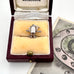 Silver vintage Dusty Bin charm in a jewelry box with 'Melbourne' text on a white background