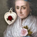 Vintage enamel guilloche heart and St Christopher charm on an old masters portrait of a woman
