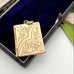 Vintage 12ct Gold Fill Book Locket on a jewellery box