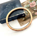 Antique gold fill bracelet on an old box with a white background