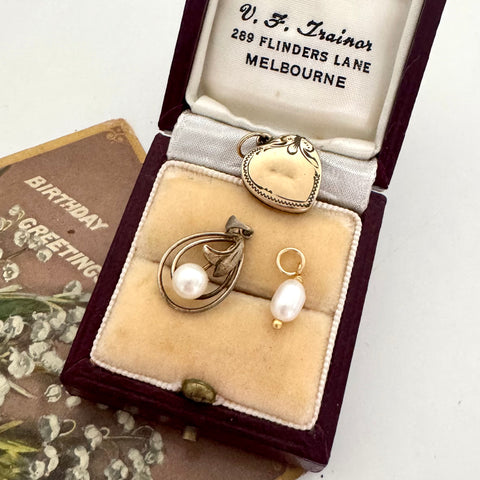 Vintage old and pearl jewelry set in a vintage box with 'V. F. Trainer' branding.