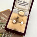 Vintage old and pearl jewelry set in a vintage box with 'V. F. Trainer' branding.