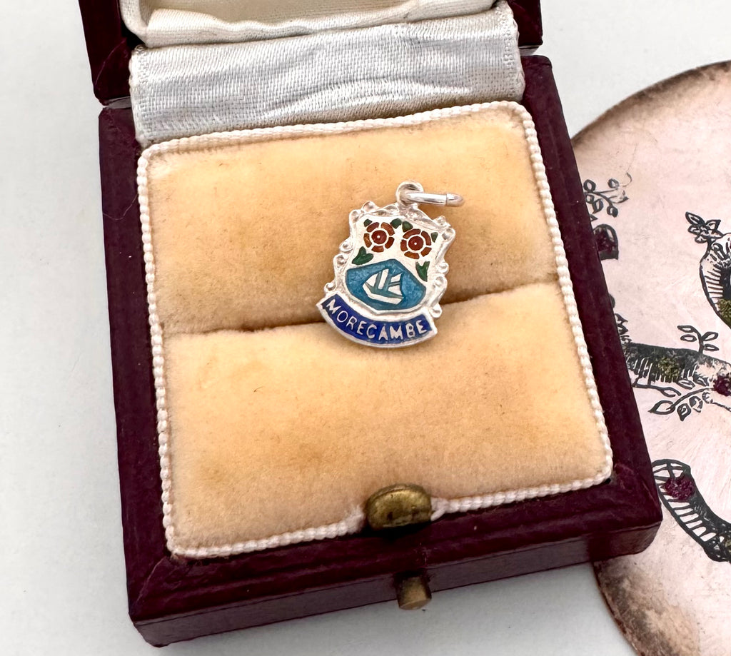 Vintage silver Morecambe travel charm in a jewellery box