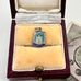 Vintage Edinburgh crest charm in a wooden box with velvet lining